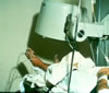 96. Fig. 8. Photograph of patient with history of operation for accessory pedal digits, with evidence of post operative vascular arterial deficiency, confirmed by arteriogram, Here the patient is undergoing deep temperature thermistor evaluation and simultaneous evaluation of blood flow utilizing a Gamma camera and technitium 99m. Providence Hospital, November 1971.
